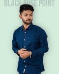 Man wearing a Formal Petrol Blue Shakura Fabric Shirt - Black Rose Point.